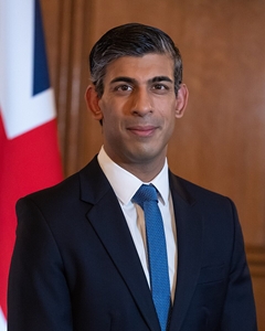 sOfficial_Portrait_of_Prime_Minister_Rishi_Sunak_crop_with_flag.jpg
